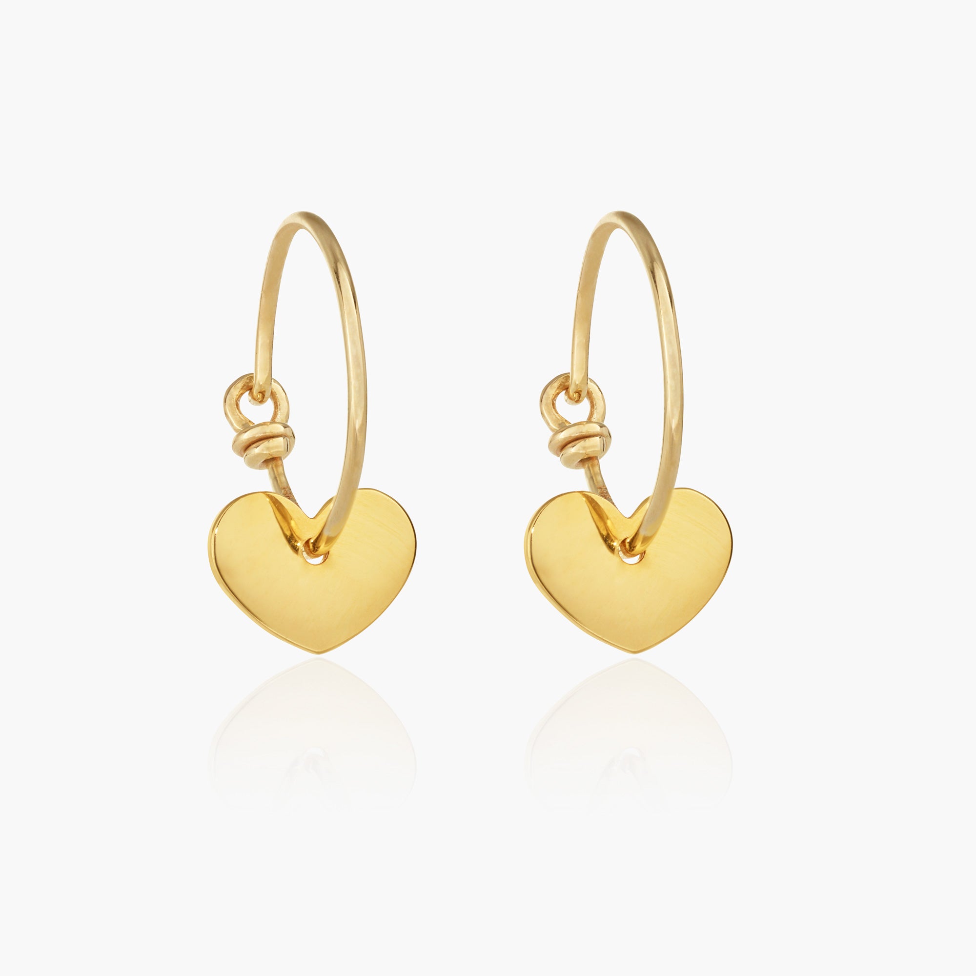 Gold heart deals dangle earrings